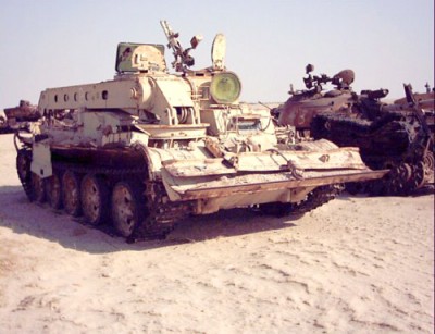 Zničený irácký WZ653 pocházející z Číny na hřbitově vojenské techniky v severním Kuvajtu, které vzniklo po první válce v Perském zálivu v roce 1991. | Destroyed Iraqi WZ653 in "Boneyard" in Northern Kuwait. This boneyard arose after first Gulf war in 1991. Photo by Dušan Rovenský, 2002