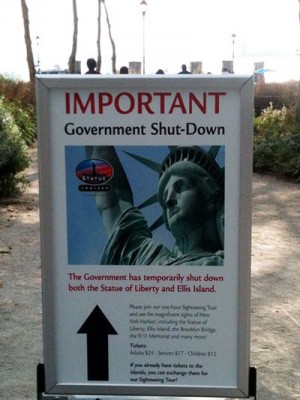 US federal government shutdown notice near the Statue of Liberty; via Wikimedia Commons